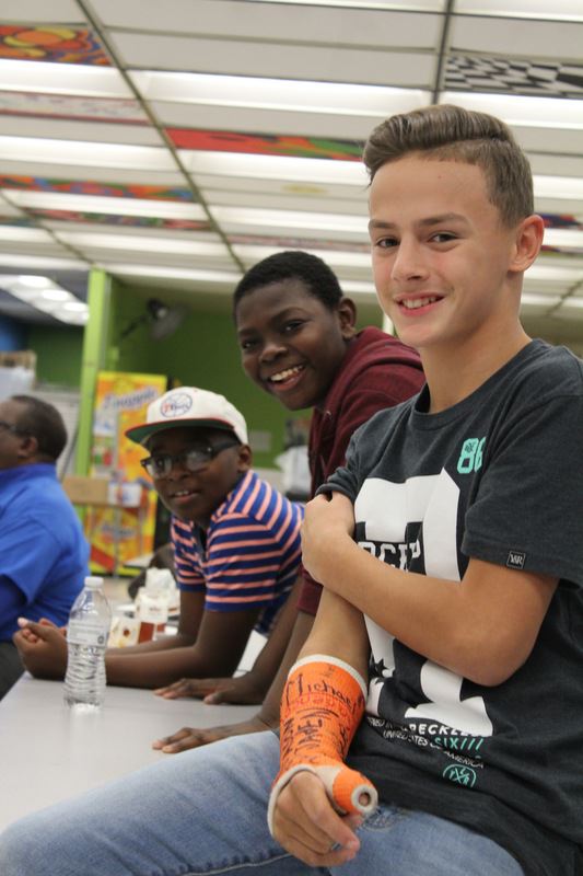 Teenage boys smiling in schools